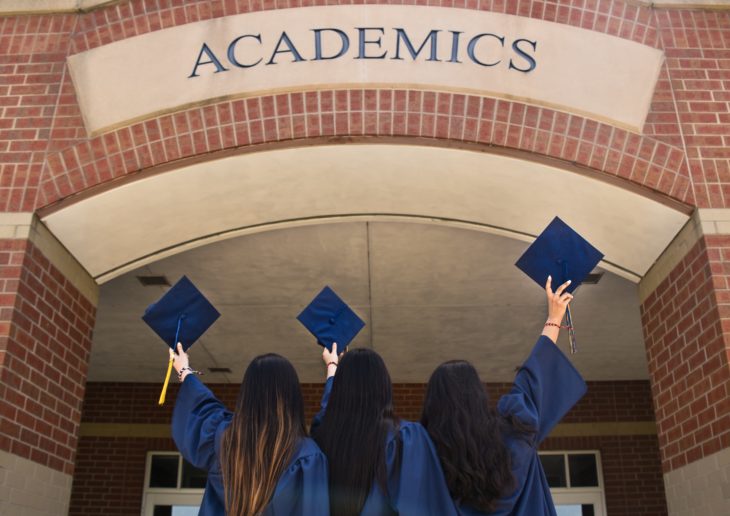 Three college grads